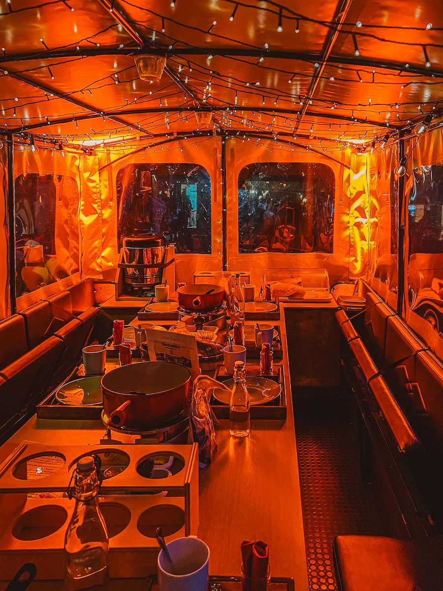 Fondue in a carriage in Lausanne in winter