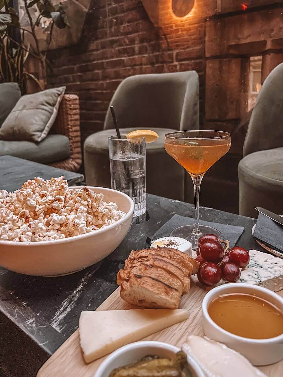 Drinks and nibbles at Bookmarks Lounge at Library Bar New York city 
