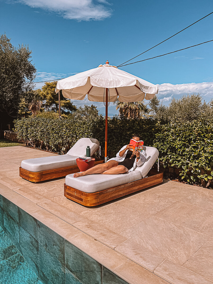 Girl on sunlounger on Zakynthos Greek reading retreat