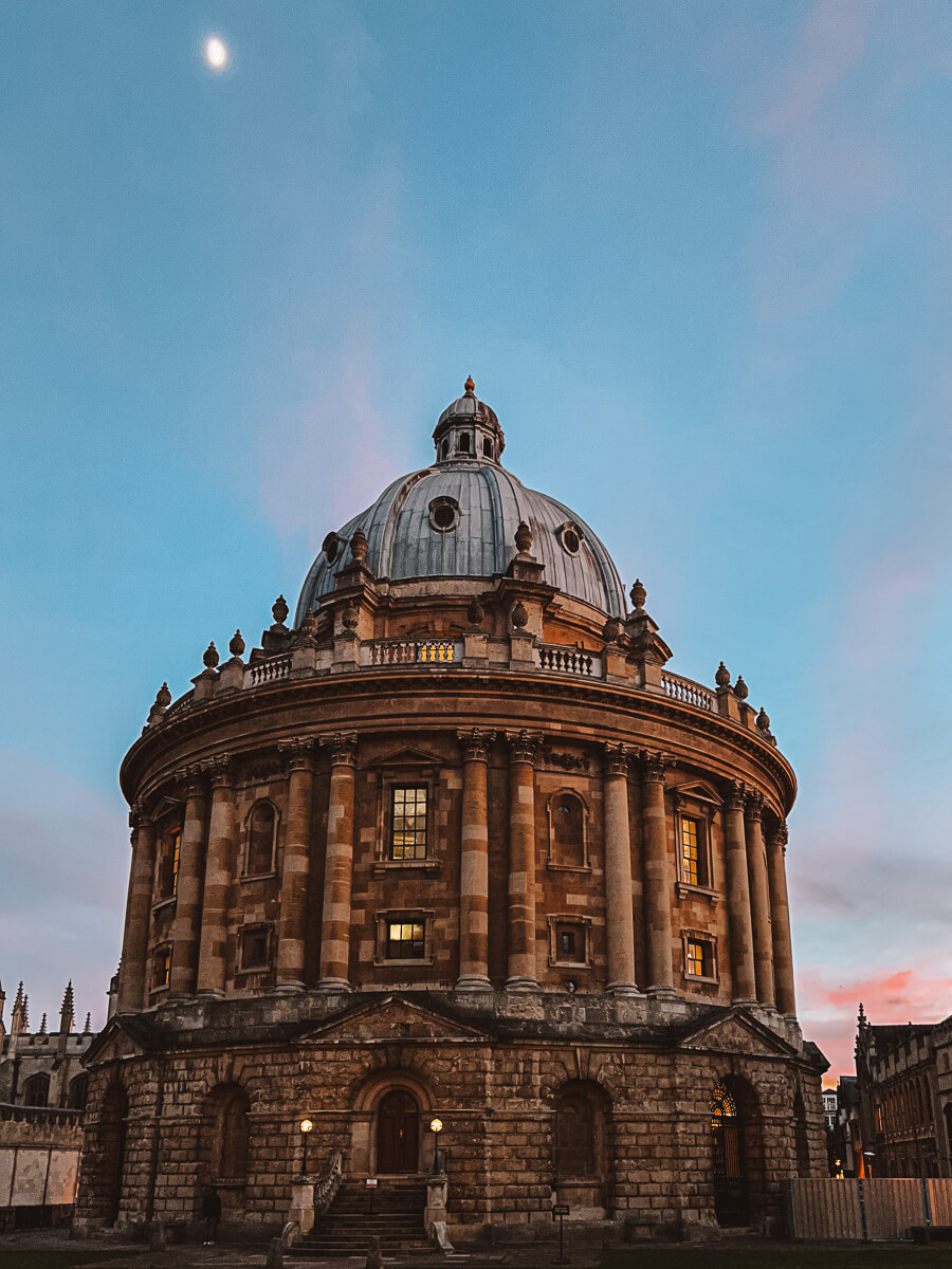 Radcliffe Camera at night with blue and pink sky