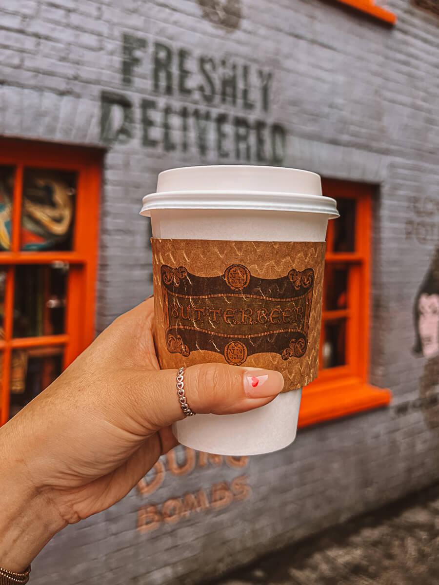 Cup of hot Butterbeer at Wizarding World of Harry Potter Orlando.